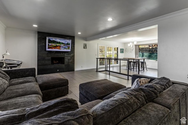 4455 S Aspen Hollow Ln, Holladay, UT 84117 - living room featuring an inviting chandelier, ornamental molding, recessed lighting, a fireplace, and wood finished floors