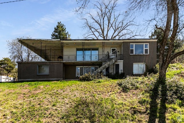 4455 S Aspen Hollow Ln, Holladay, UT 84117 - rear view of house featuring stairway and brick siding