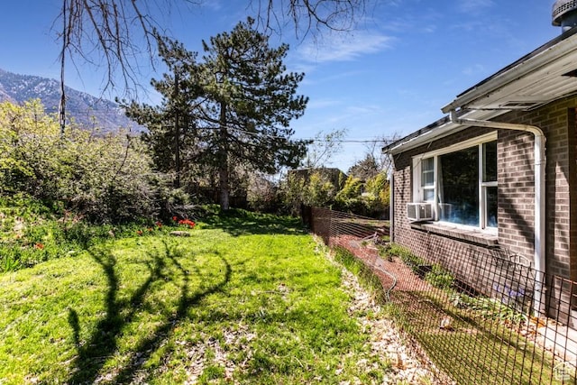 4455 S Aspen Hollow Ln, Holladay, UT 84117 - view of yard with a mountain view, fence, and cooling unit