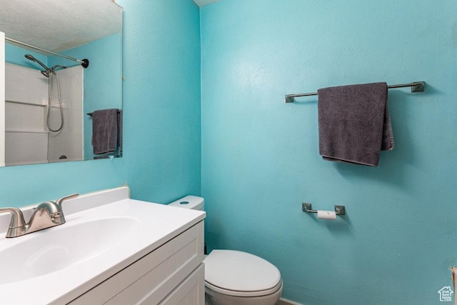 4455 S Aspen Hollow Ln, Holladay, UT 84117 - bathroom with toilet, a shower, and vanity