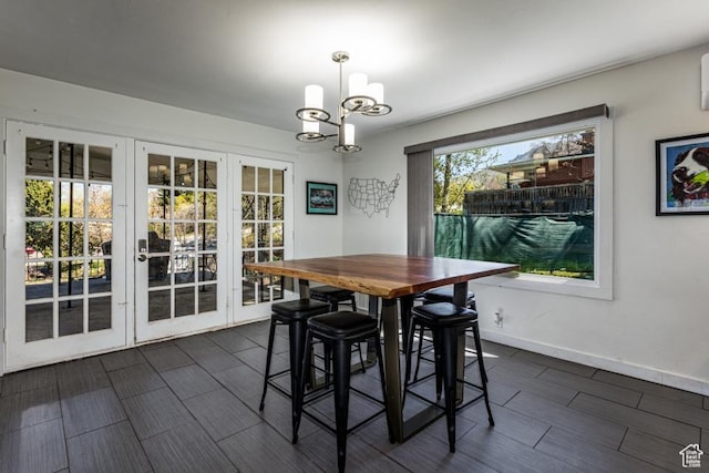 4455 S Aspen Hollow Ln, Holladay, UT 84117 - dining area featuring baseboards and an inviting chandelier