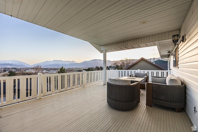 wooden terrace with a mountain view