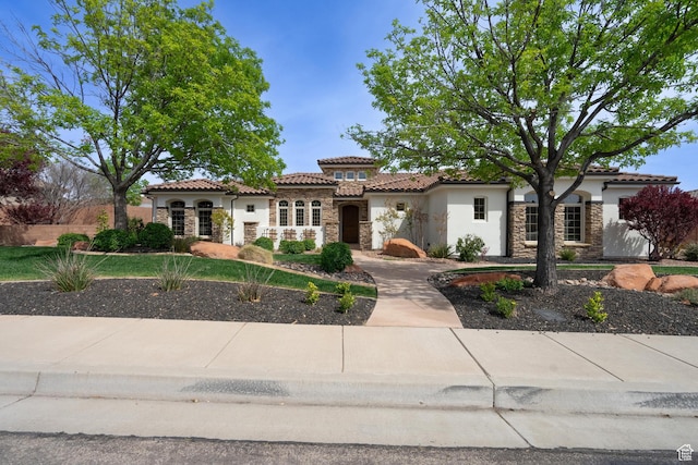 1844 N Wellington St, Washington, UT 84780 - mediterranean / spanish house with a tile roof, stucco siding, and stone siding