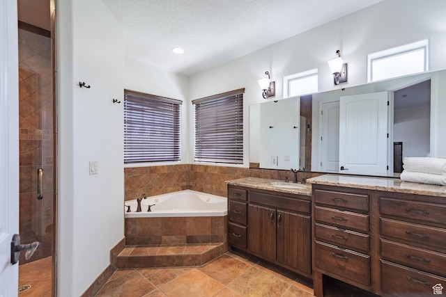 1844 N Wellington St, Washington, UT 84780 - full bath featuring a stall shower, vanity, and a garden tub