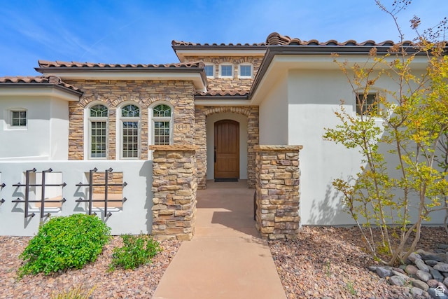 1844 N Wellington St, Washington, UT 84780 - exterior space featuring stone siding, stucco siding, and a tiled roof