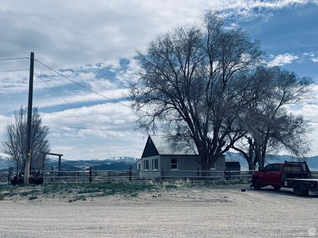 4270 W 2000 N, Malad City, ID 83252 - view of front of home with a mountain view and fence