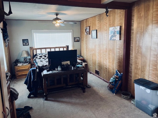 4270 W 2000 N, Malad City, ID 83252 - home office with wood walls, a ceiling fan, and carpet flooring