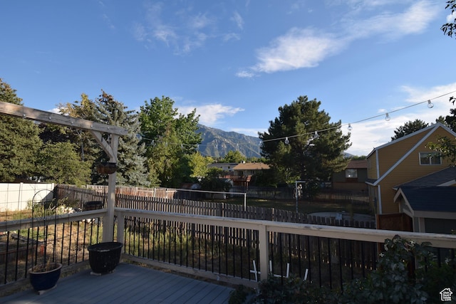 9111 S Parakeet Dr, Sandy, UT 84093 - wooden deck with a mountain view and fence private yard