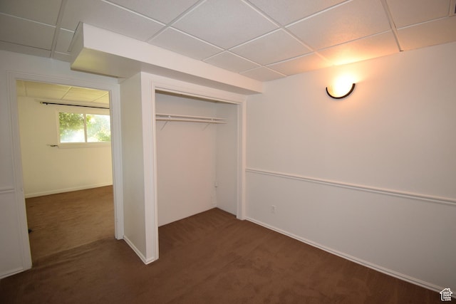 9111 S Parakeet Dr, Sandy, UT 84093 - unfurnished bedroom with dark carpet, a closet, and a drop ceiling