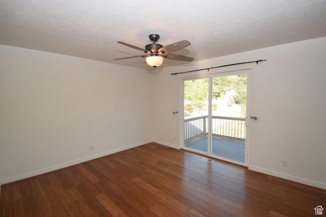 9111 S Parakeet Dr, Sandy, UT 84093 - empty room with visible vents, baseboards, ceiling fan, a textured ceiling, and wood finished floors