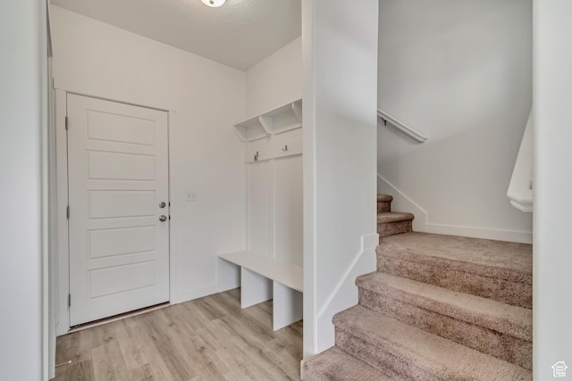 mudroom featuring light wood-style flooring
