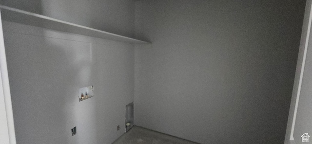 clothes washing area featuring laundry area and hookup for a washing machine