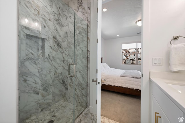 bathroom featuring ensuite bathroom, recessed lighting, vanity, a marble finish shower, and marble finish floor