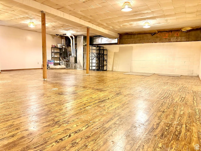 finished below grade area with wood-type flooring
