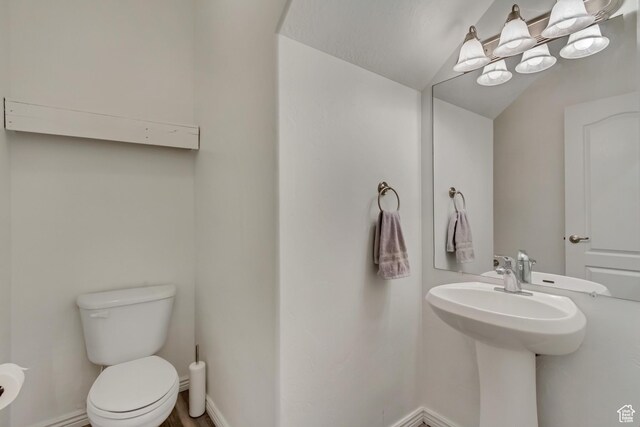24 S 1520 W, Pleasant Grove, UT 84062 - bathroom with toilet, a sink, and baseboards