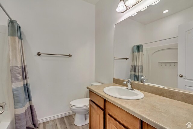 24 S 1520 W, Pleasant Grove, UT 84062 - bathroom with shower / bath combo with shower curtain, vanity, toilet, and wood finished floors