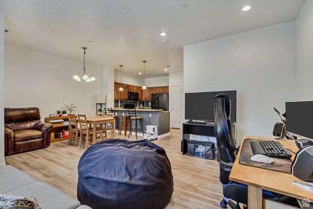 24 S 1520 W, Pleasant Grove, UT 84062 - living area with light wood-style flooring, a notable chandelier, and recessed lighting