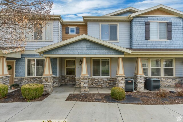 24 S 1520 W, Pleasant Grove, UT 84062 - view of front of home featuring a porch, cooling unit, and stone siding