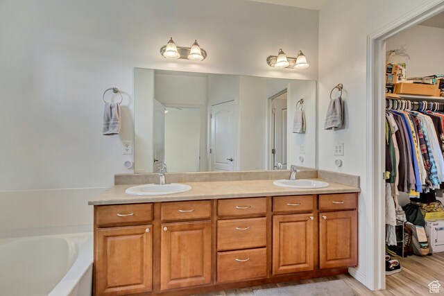 24 S 1520 W, Pleasant Grove, UT 84062 - full bath with a sink, a walk in closet, a bath, and double vanity