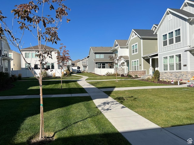 4434 W Glendon Dr, Lehi, UT 84043 - surrounding community featuring a lawn and a residential view