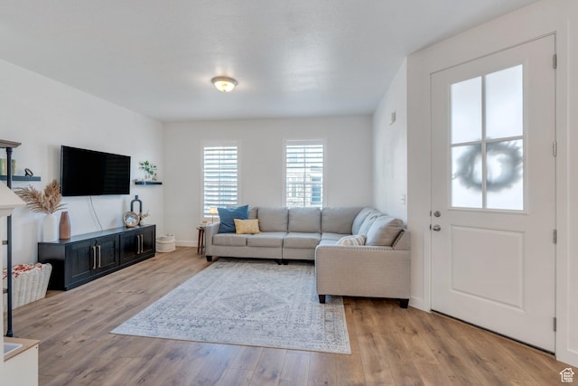 4434 W Glendon Dr, Lehi, UT 84043 - living area featuring wood finished floors and baseboards