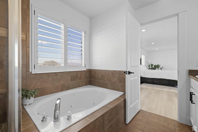 4634 W Baldy Dr, West Jordan, UT 84088 - ensuite bathroom with plenty of natural light, connected bathroom, and a whirlpool tub