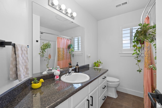 4634 W Baldy Dr, West Jordan, UT 84088 - full bathroom with vanity, toilet, tile patterned floors, curtained shower, and visible vents