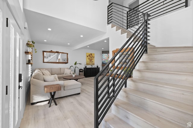 4634 W Baldy Dr, West Jordan, UT 84088 - stairway featuring recessed lighting and wood finished floors