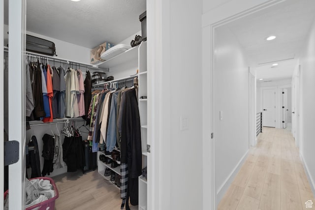 4634 W Baldy Dr, West Jordan, UT 84088 - spacious closet with wood finished floors