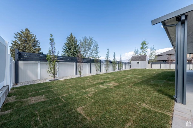 4634 W Baldy Dr, West Jordan, UT 84088 - view of yard with an outbuilding and a fenced backyard