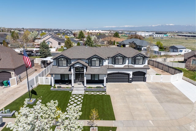 4634 W Baldy Dr, West Jordan, UT 84088 - french country inspired facade with fence, an attached garage, driveway, and a residential view