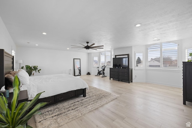 4634 W Baldy Dr, West Jordan, UT 84088 - bedroom with baseboards, recessed lighting, a textured ceiling, a ceiling fan, and light wood-style flooring