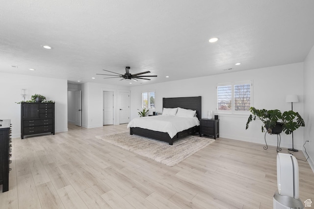 4634 W Baldy Dr, West Jordan, UT 84088 - bedroom with recessed lighting, light wood-style floors, and multiple windows