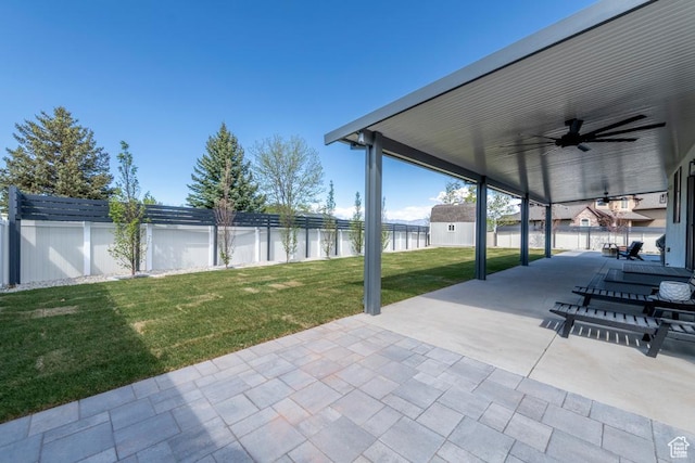 4634 W Baldy Dr, West Jordan, UT 84088 - view of patio / terrace featuring a fenced backyard, a ceiling fan, and a water view