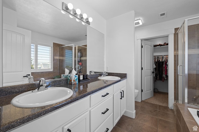 4634 W Baldy Dr, West Jordan, UT 84088 - bathroom with a sink, a shower stall, and double vanity