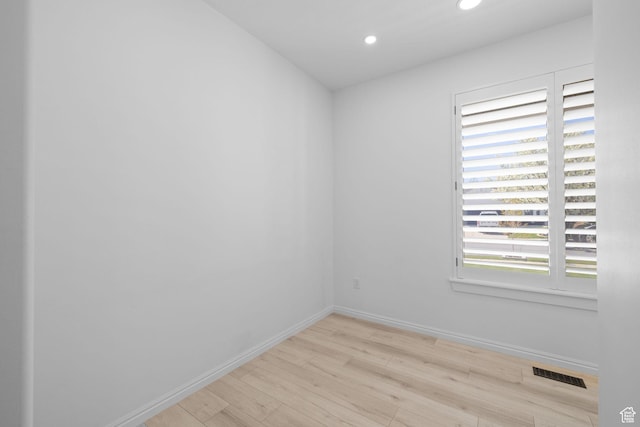 4634 W Baldy Dr, West Jordan, UT 84088 - spare room with baseboards, recessed lighting, wood finished floors, and visible vents