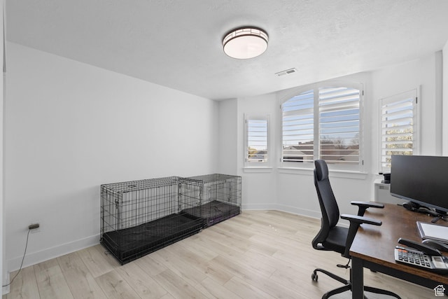 4634 W Baldy Dr, West Jordan, UT 84088 - office with visible vents, baseboards, and wood finished floors
