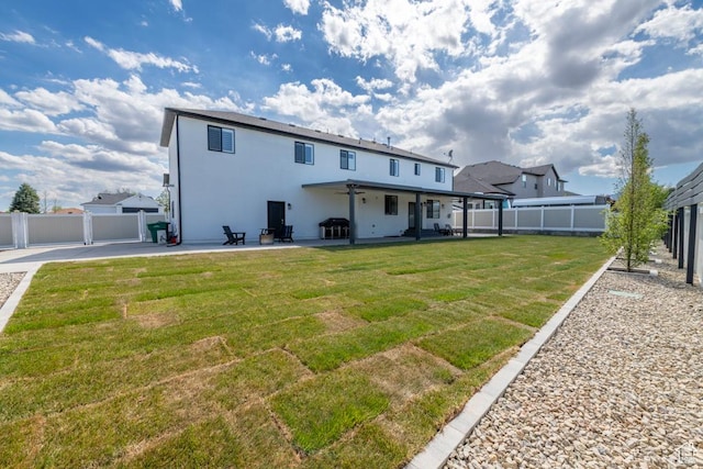 4634 W Baldy Dr, West Jordan, UT 84088 - back of house featuring a lawn, a patio, a fenced backyard, and stucco siding