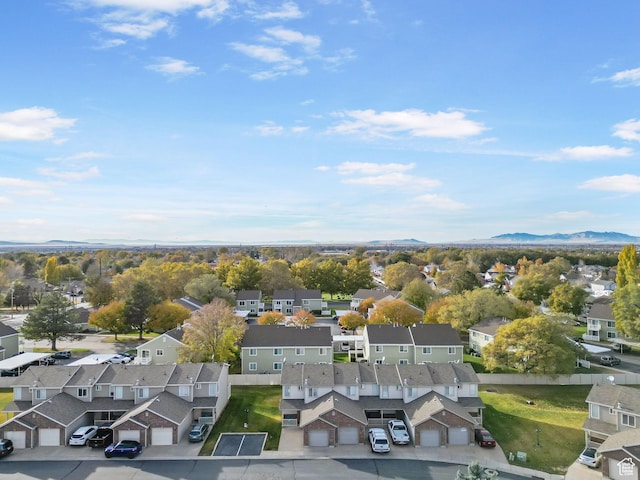 aerial view featuring a mountain view and a residential view