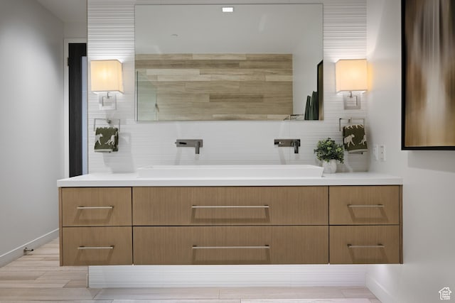 333 Main St Unit 23, Park City, UT 84060 - full bathroom with vanity, baseboards, and backsplash