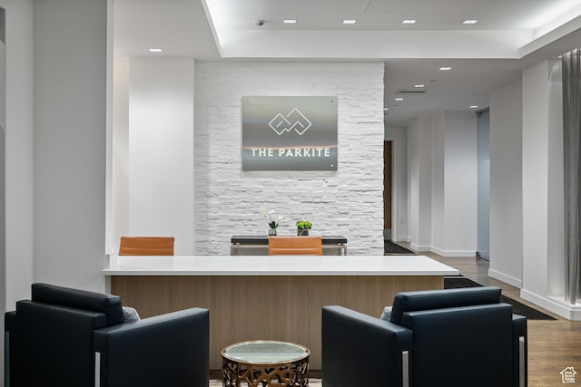333 Main St Unit 23, Park City, UT 84060 - bar with a tray ceiling, wood finished floors, baseboards, and recessed lighting