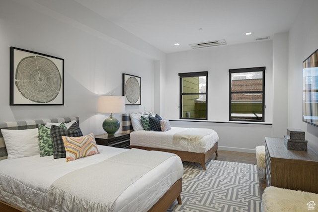 333 Main St Unit 23, Park City, UT 84060 - bedroom featuring visible vents, baseboards, recessed lighting, and wood finished floors