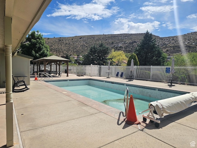 16 Mountain Vw, Hurricane, UT 84737 - pool featuring a gazebo, a mountain view, fence, and a patio area