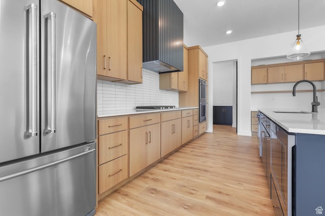 4125 N Maple Blvd W Unit 119, Lehi, UT 84043 - kitchen with appliances with stainless steel finishes, a sink, light countertops, light wood-style floors, and recessed lighting