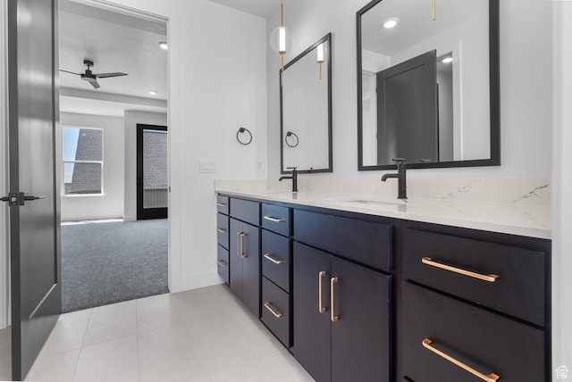 4125 N Maple Blvd W Unit 119, Lehi, UT 84043 - full bathroom with double vanity, ceiling fan, recessed lighting, and baseboards