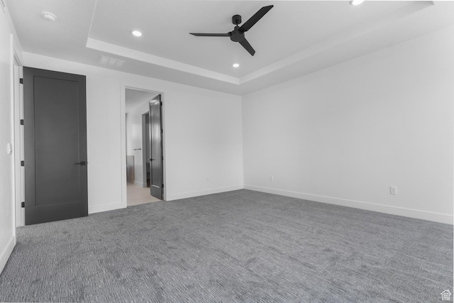 4125 N Maple Blvd W Unit 119, Lehi, UT 84043 - unfurnished bedroom featuring a tray ceiling, recessed lighting, carpet flooring, and baseboards