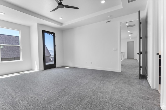 4125 N Maple Blvd W Unit 119, Lehi, UT 84043 - empty room featuring carpet floors, ceiling fan, a raised ceiling, plenty of natural light, and recessed lighting