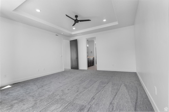4125 N Maple Blvd W Unit 119, Lehi, UT 84043 - carpeted empty room featuring a raised ceiling, a ceiling fan, recessed lighting, and baseboards