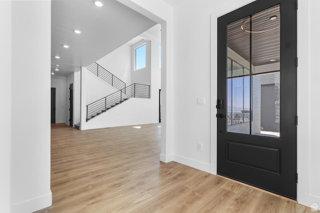 4125 N Maple Blvd W Unit 119, Lehi, UT 84043 - foyer entrance with baseboards, stairs, wood finished floors, and recessed lighting