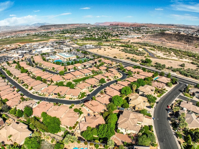 drone / aerial view featuring a mountain view and a residential view